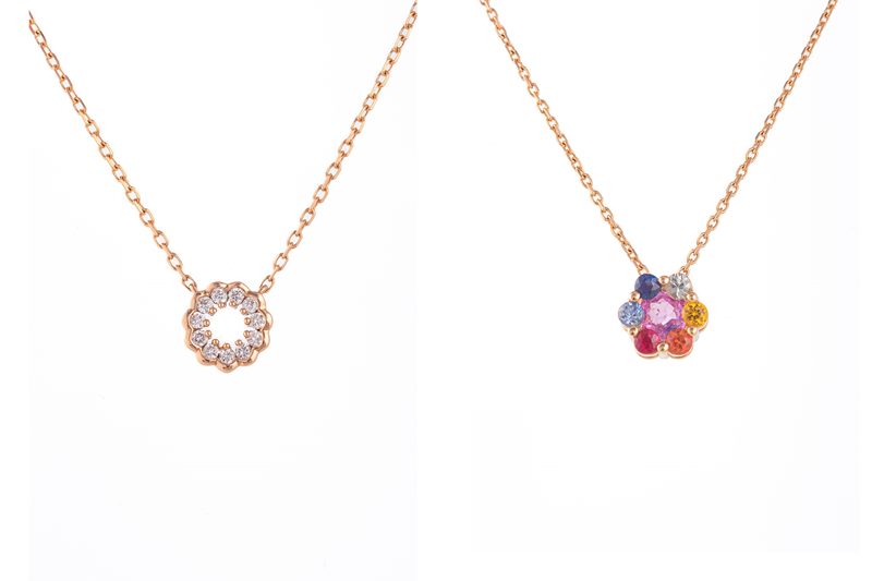 Rose gold pırlantalı minik halka kolye ve rengarenk safir taşlarla süslü çiçek kolye ucu, beyaz fonda çekim